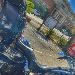 a motorcycle with a backpack on the back