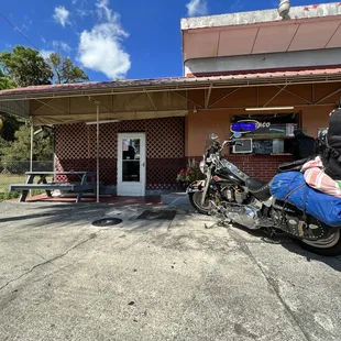 a motorcycle parked in front of a building