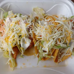 2 fish,2 chicken  tacos Doesn't look like much on the outside, but this place is a gem! 4 tacos for under 10 bucks!!!