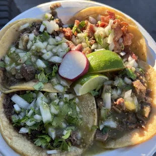 Spicy salsa is green and not spicy at all not even a tickle of it 2 cabezas, tripa, and lengua.