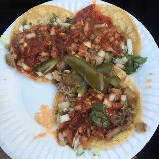 Carnitas tacos with everything. Delish! The carnitas are always cooked perfectly, and the overall flavor is always on point.