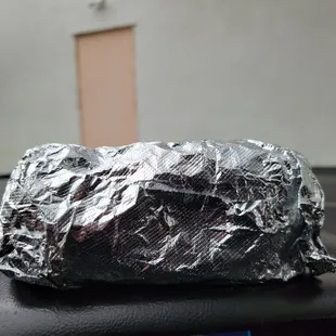 a wrapper wrapped in aluminum foil