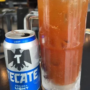 a drink and a can of state light