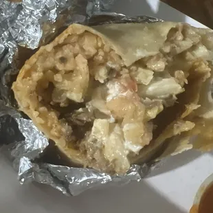 $17 burrito should be stuffed with meat not rice. I can buy 20lbs of rice at Costco for 12$