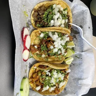 three tacos on a plate