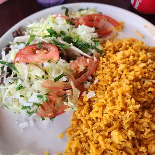 Steak tacos on flour tortillas. It's missing one because my oldest son already ate it.