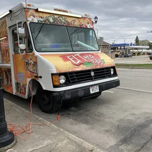 a food truck parked in a parking lot