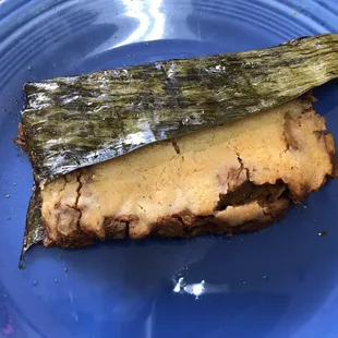 Pork tamale wrapped in banana leaf. No more Hormel canned tamales for me!