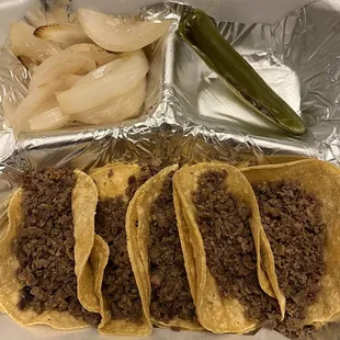 Corn Mini Tacos (5) with Fajita meat.