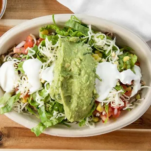 a bowl of salad with avocado