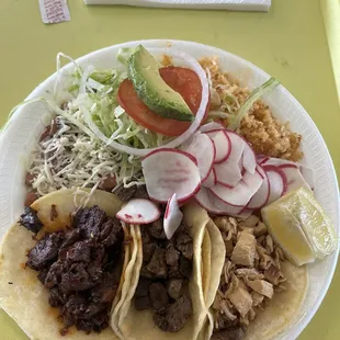 Pastro Carne asada and chicken tacos with beans and rice. No flavor. Rice is cold  I will not eat here again. Go elsewhere