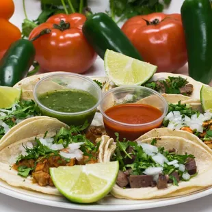 corn tortilla ,your choice of meat (steak, chicken, pork,mexican sausage, beef tongue) toping with onion , cilantro and salsa