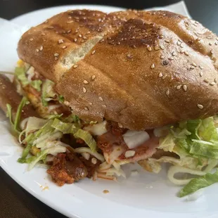 Tosta Cubano sandwich. My dinner companion loved it. It's ham, egg, sausage, lettuce and avocado on a huge toasted bun.