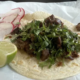Lengua (beef tongue) tacos. Yes. It's beef tongue. Yes, it's authentic and delicious. Try it!