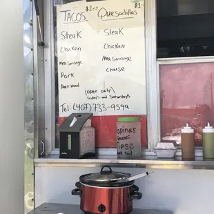 a food truck with a menu