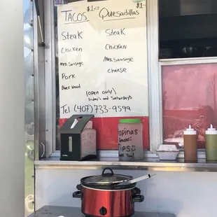 a menu on a food truck