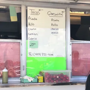 a menu on a food truck