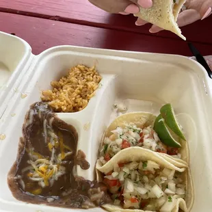 a person holding a tortilla