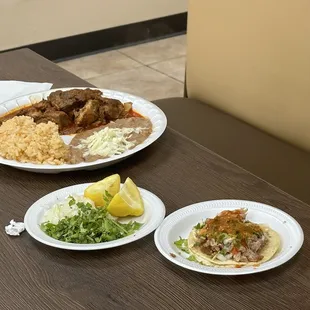 three plates of food on a table