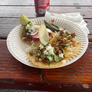 Tacos Al Pastor!!! They are feign good, really Come to this place, super affordable and the flavor is great!!!