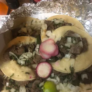 a plate of tacos on a table