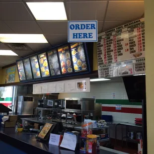 a sign that says order here