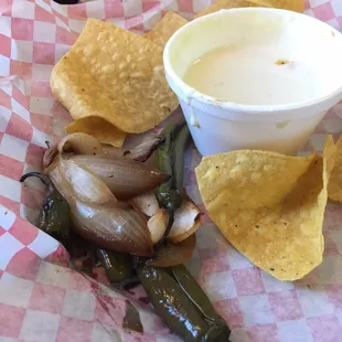 Free roasted onions and jalapeños (with some serviceable but not really worth 4 bucks queso)