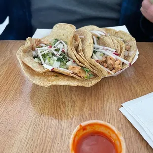 a plate of tacos on a table