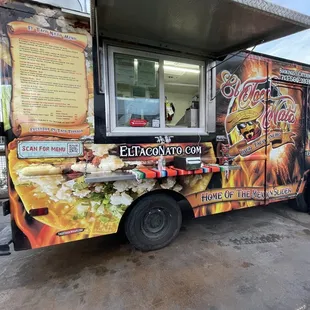 a food truck parked in a parking lot