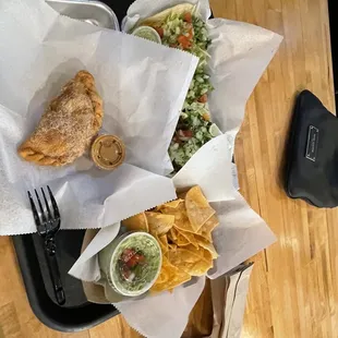 Apple Empanada  Nachos w/guacamole  3 beef tacos