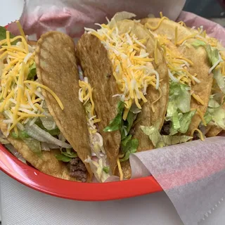 3 hard shell tacos with rice and beans