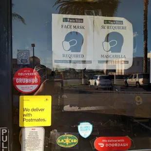 a sign in the window of a restaurant