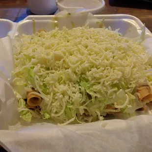 12 roll tacos under all that cheese...