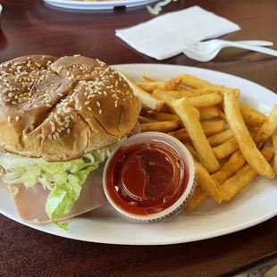 Mexican burger with fries