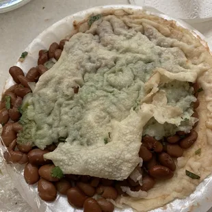 My gordita no cheese no meat. She handmade the tortilla &amp; added guacamole. Soggy due to the long ride home but delish nonetheless.