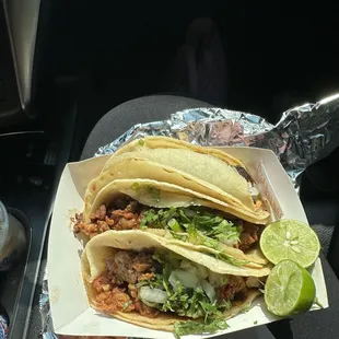 Corn tortillas- from top to bottom barbacoa, pastor, and chicharrones.