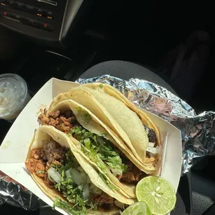 Corn tortillas- from top to bottom barbacoa, pastor, and chicharrones.