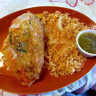 Chile's rellenos is stuffed pepper fried with an egg batter with Mexican cheese inside. Really good!