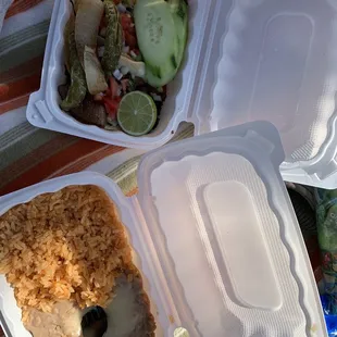 Tacos with a side of Rice and Beans with Cheese