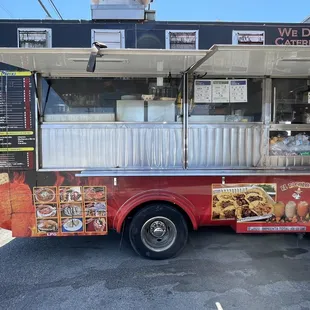 a food truck parked in a parking lot