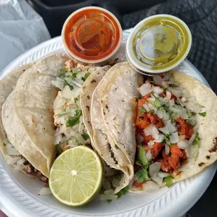 4 tacos (asada, pollo, barbacoa, and Pastor)