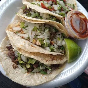 1 Barbacoa, 1 pollo, 1 asada, and 1 Pastor taco