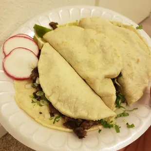 Hard to see the inside [asada] but those tortillas are soooooo good!