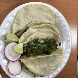Carne asada tacos with guacamole &amp; salsa