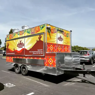 a food truck in a parking lot
