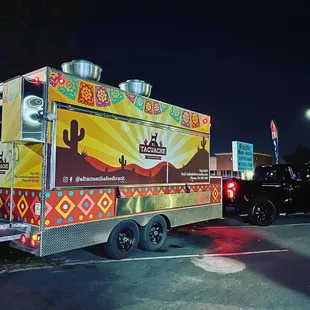 a food truck parked in a parking lot