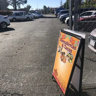 Signage at rear next to parking area