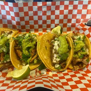 Two adobada two carnitas tacos I had one asada but I ate it already lmao