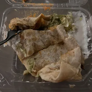 a burrito in a plastic container