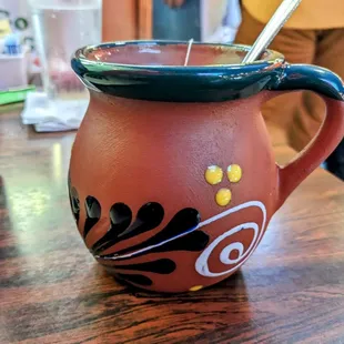 Tea is served in Mexican clay mugs